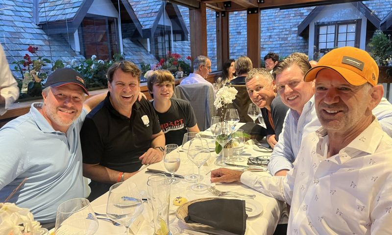 Newey and Brown swap caps during dinner party