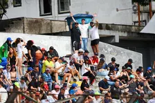 Thumbnail for article: Bizarre images in Brazil: Fans climb over fences around track