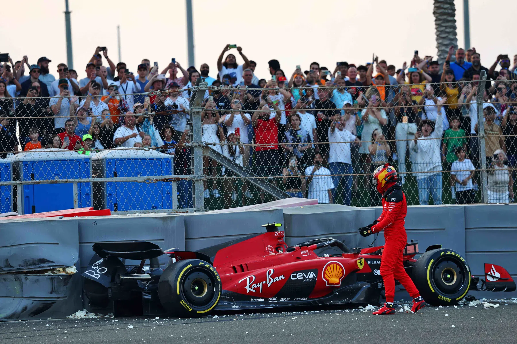 carlos sainz apologises to Ferrari after heavy crash abu dhabi