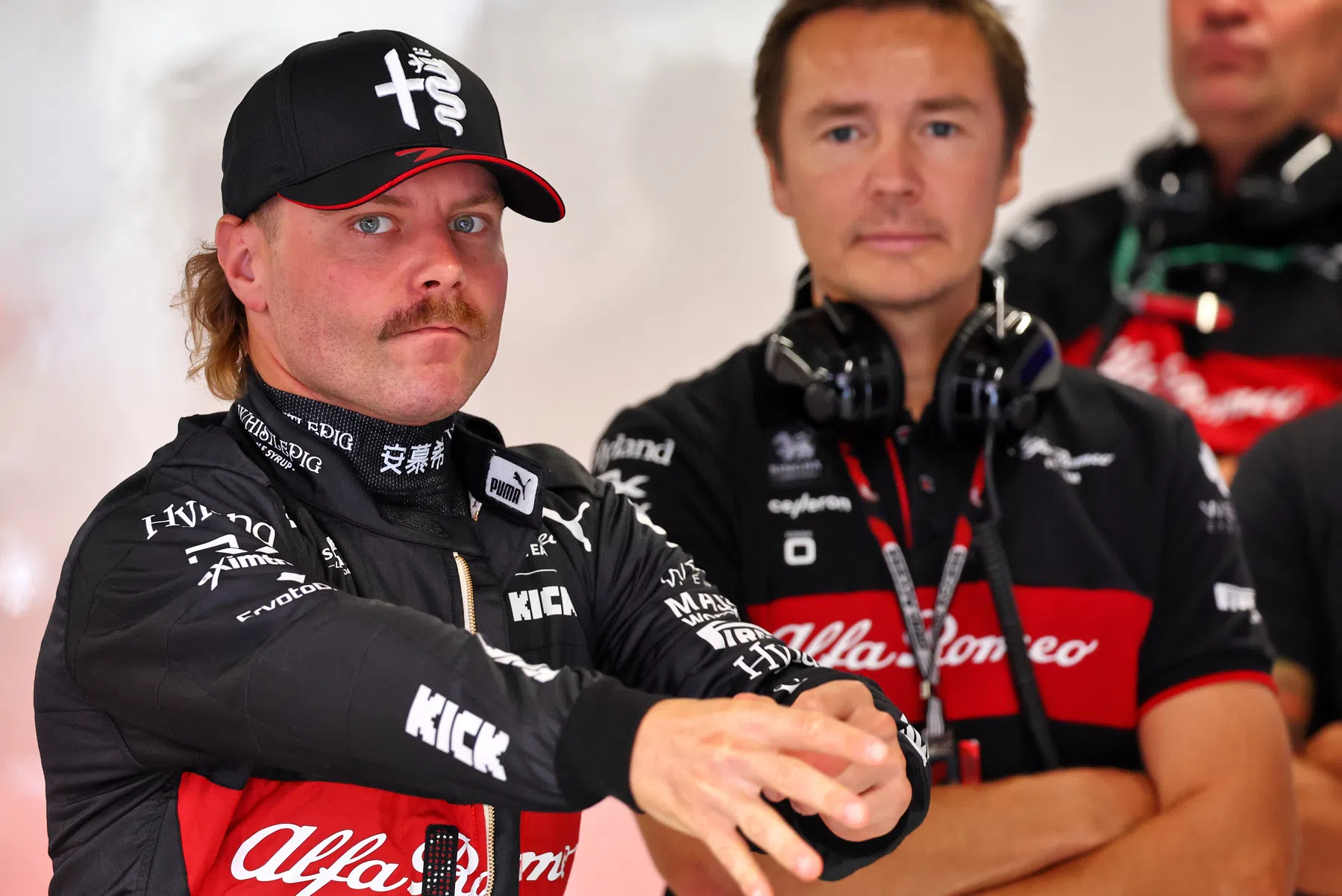 bottas runs down the beach in speedo