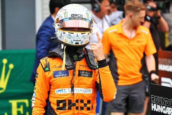 Lando Norris raises incredible amount for charity with helmet auction