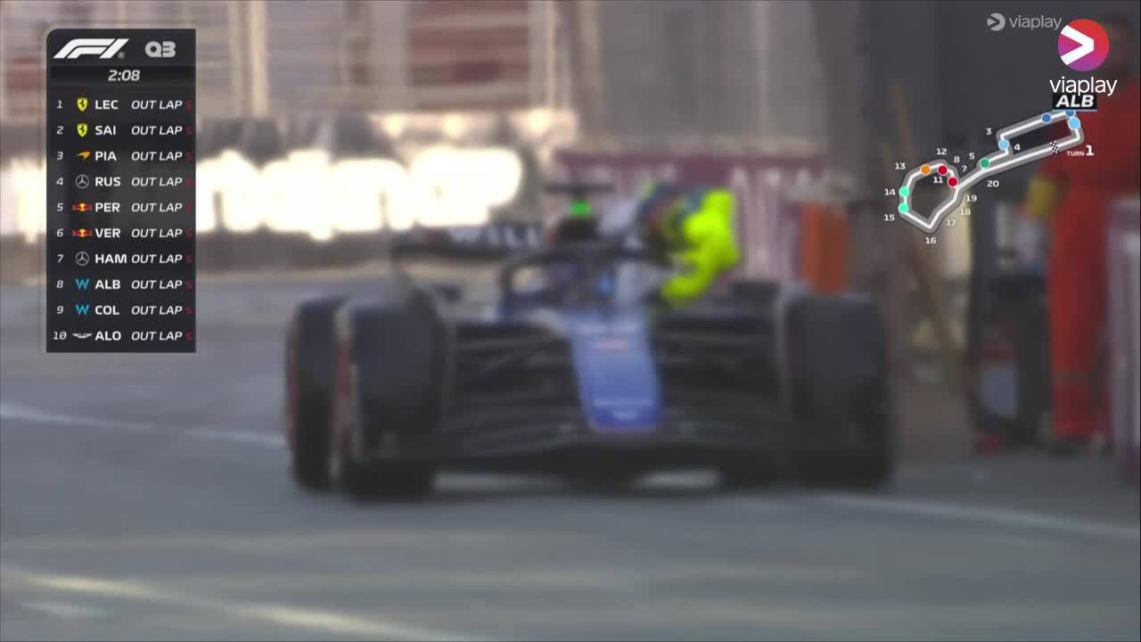 Alex Albon drives away with fan and ice in his Williams