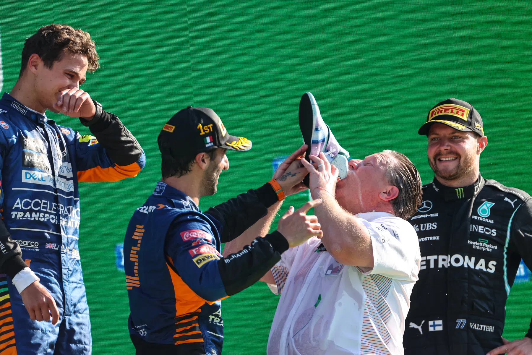 Zak Brown drives Daniel Ricciardo's McLaren F1 car at Silverstone